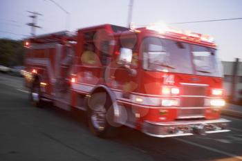 Royalty Free Photo of a Firetruck Rushing to a Fire