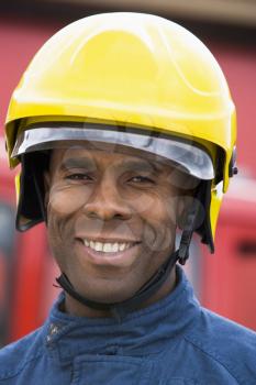 Royalty Free Photo of a Firefighter in a Helmet