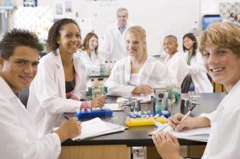 Royalty Free Clipart Image of Students in a Lab