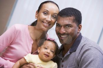 Royalty Free Photo of a Couple With a Baby Girl