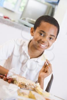 Royalty Free Photo of a Student Eating Lunch