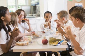 Royalty Free Photo of a Students Eating in a Cafeteria