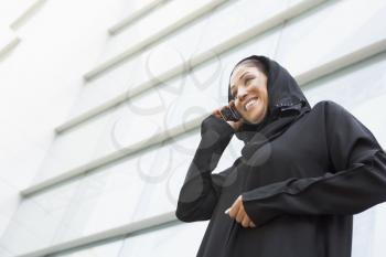 Royalty Free Photo of a Middle Eastern Woman With a Cellphone