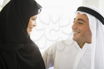 Royalty Free Photo of a Middle East Couple Facing Each Other
