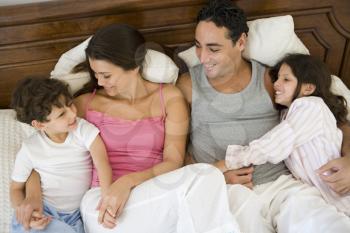 Royalty Free Photo of a Family in Bed