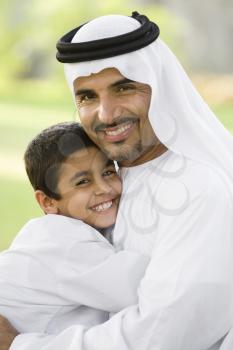 Royalty Free Photo of a Father and Son Outside