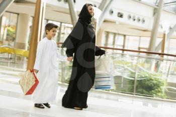 Royalty Free Photo of a Mother and Son Shopping