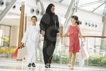 Royalty Free Photo of a Woman in the Mall With Her Two Children