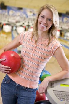 Royalty Free Photo of a Woman at a Bowling Alley