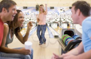 Royalty Free Photo of Two Couples Bowling