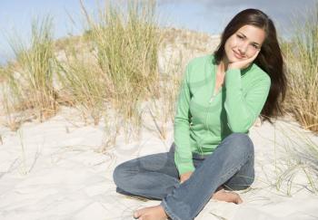 Royalty Free Photo of a Young Girl on the Sand