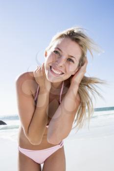 Royalty Free Photo of a Young Woman at the Beach