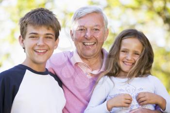 Royalty Free Photo of a Man With His Grandchildren