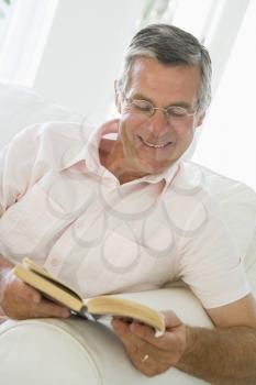 Royalty Free Photo of a Man Reading a Book