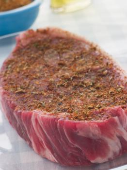 Royalty Free Photo of a Steak With Rub
