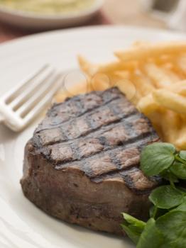 Royalty Free Photo of a Fillet Steak Frite and Watercress
