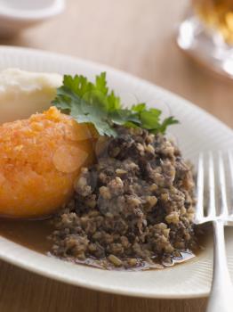 Royalty Free Photo of Plate of Haggis Neeps and Tatties