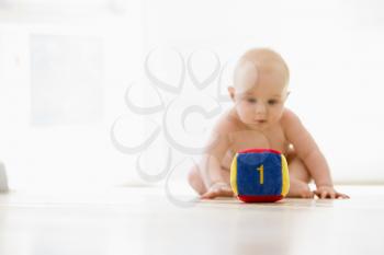 Royalty Free Photo of a Baby With a Block