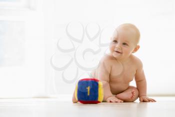 Royalty Free Photo of a Baby With a Block