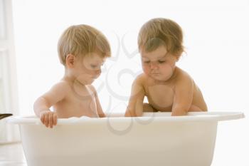 Royalty Free Photo of Two Babies in a Bath