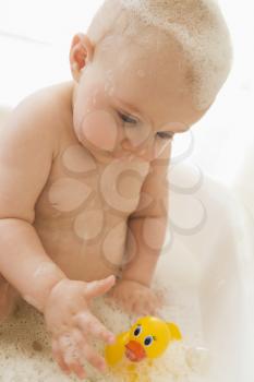 Royalty Free Photo of a Baby in a Bubble Bath