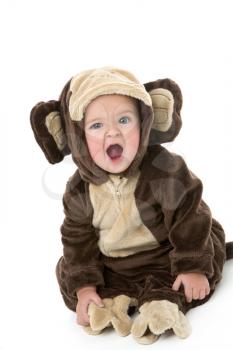 Royalty Free Photo of a Baby in a Monkey Costume