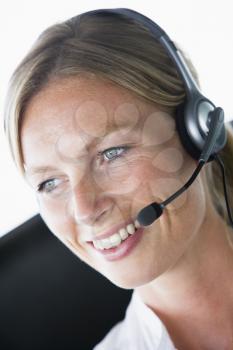 Royalty Free Photo of a Woman Wearing a Headset