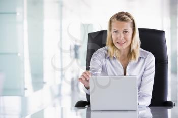 Royalty Free Photo of a Woman With s Laptop