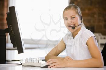 Royalty Free Photo of a Girl Wearing a Headset