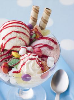 Royalty Free Photo of a Trio of Ice Cream and Sweet Sundae