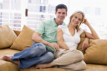Royalty Free Photo of a Couple on a Couch