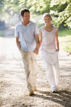 Royalty Free Photo of a Couple Walking
