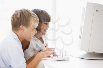 Royalty Free Photo of Two Children at the Computer