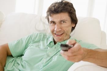 Royalty Free Photo of a Man With a Remote