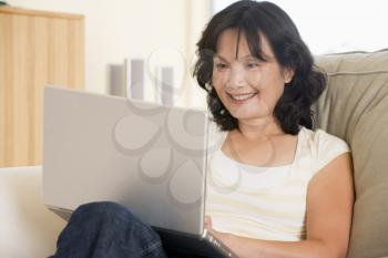 Royalty Free Photo of a Woman Using a Laptop