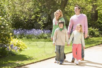 Royalty Free Photo of a Family on a Path