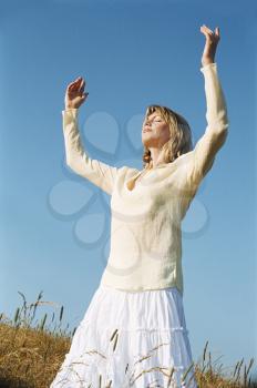 Royalty Free Photo of a Woman Standing Outside