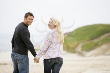 Royalty Free Photo of a Couple Walking on the Beach