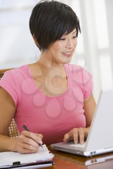 Royalty Free Photo of a Woman Doing Her Books