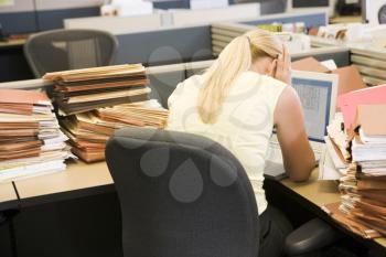 Royalty Free Photo of a Woman With a Stack of Files