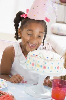 Royalty Free Photo of a Little Girl With a Birthday Cake