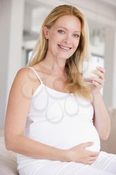 Royalty Free Photo of a Woman With a Glass of Milk