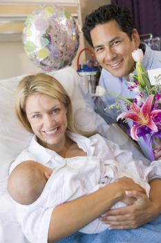 Royalty Free Photo of a New Family in the Hospital