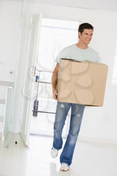 Royalty Free Photo of a Man Moving Into a New House