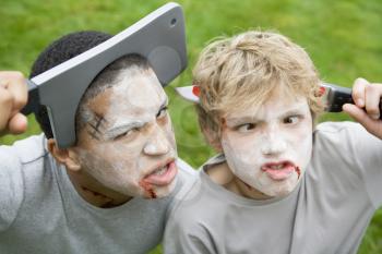 Royalty Free Photo of Boys With Scary Halloween Gags