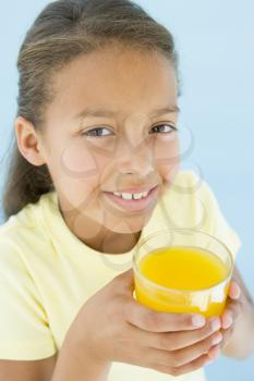Royalty Free Photo of a Girl With Juice