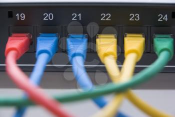 Royalty Free Photo of Computer Cables Connected To A Router