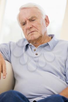 Royalty Free Photo of an Older Man Looking Unwell