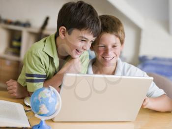 Royalty Free Photo of Two Boys With a Laptop
