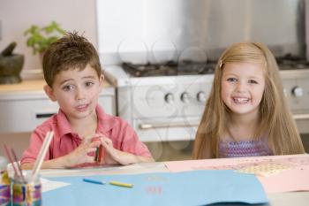 Royalty Free Photo of Two Children Doing Artwork